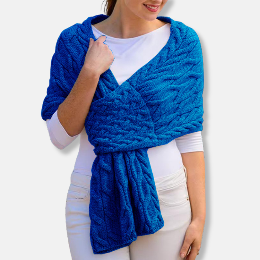 Women's cream wool cable knit shawl scarf with long draped coverage and textured pattern