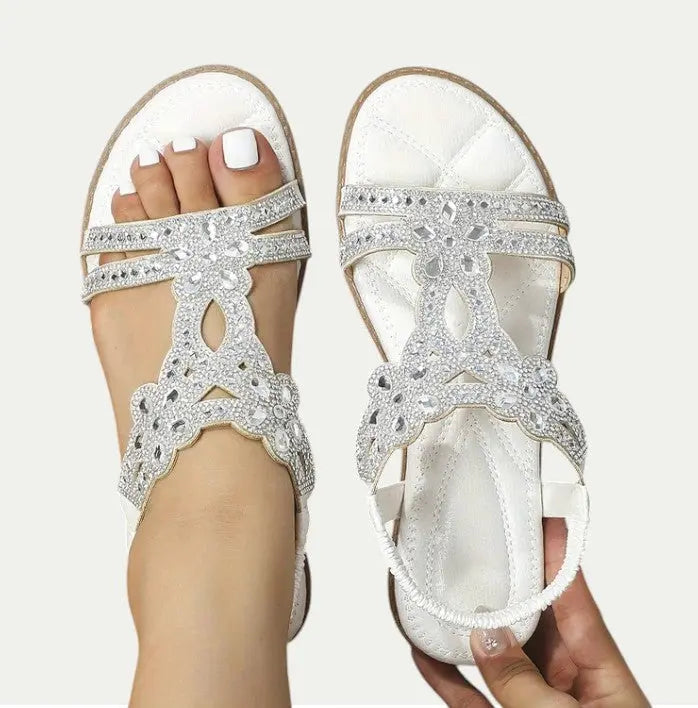 Women's brown bohemian flat sandals with cushioned insole and strappy boho design