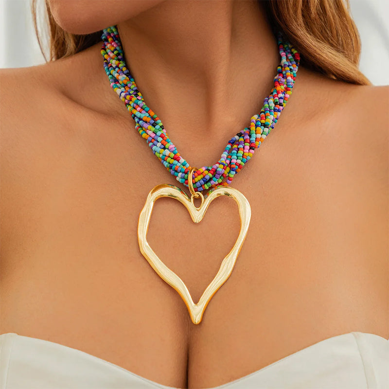 Bohemian oversized matte gold open heart pendant necklace with braided woven cord adjustable closure