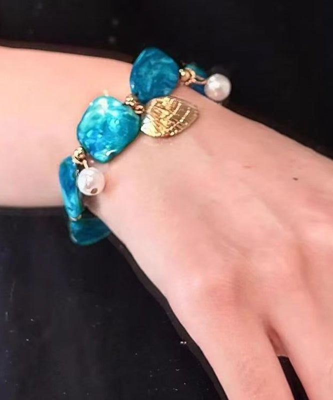 Bracelet à breloques asymétriques en alliage bleu bohème avec coquillages pour les fêtes - Wavlynn
