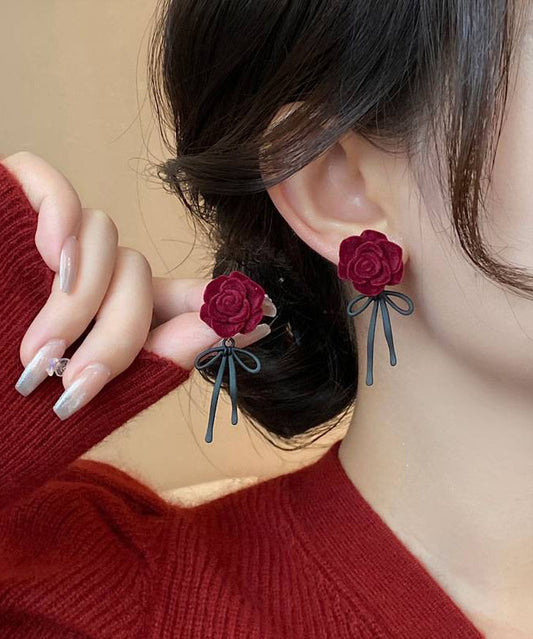 Boucles d'oreilles à tige style bohème en alliage de cuivre rouge avec nœud rose floqué - Wavlynn