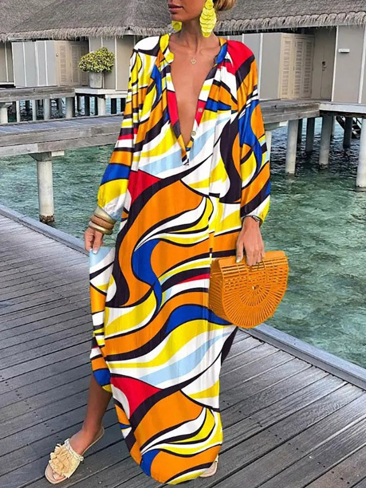 Colorful boho print maxi dress with flowing ankle-skimming silhouette for breezy resort-ready style