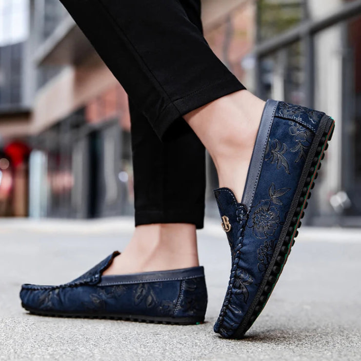 Bonanza loafers with embossed floral detailing, flexible rubber outsole, classic slip-on style