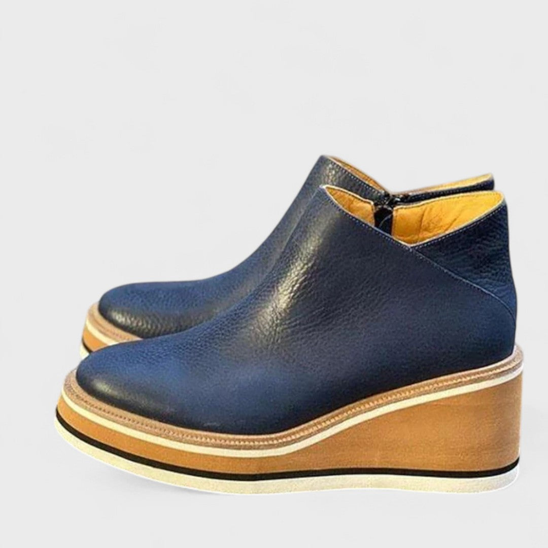 Elegant waterproof shoes in neutral tone with polished silhouette and all-day supportive sole