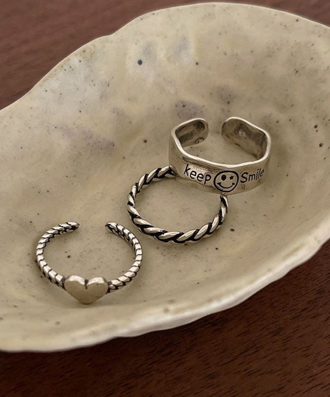Ensemble de trois bagues en argent sterling Boutique Silk avec motif « Amour, visage souriant et torsades de pâte frite » - Wavlynn