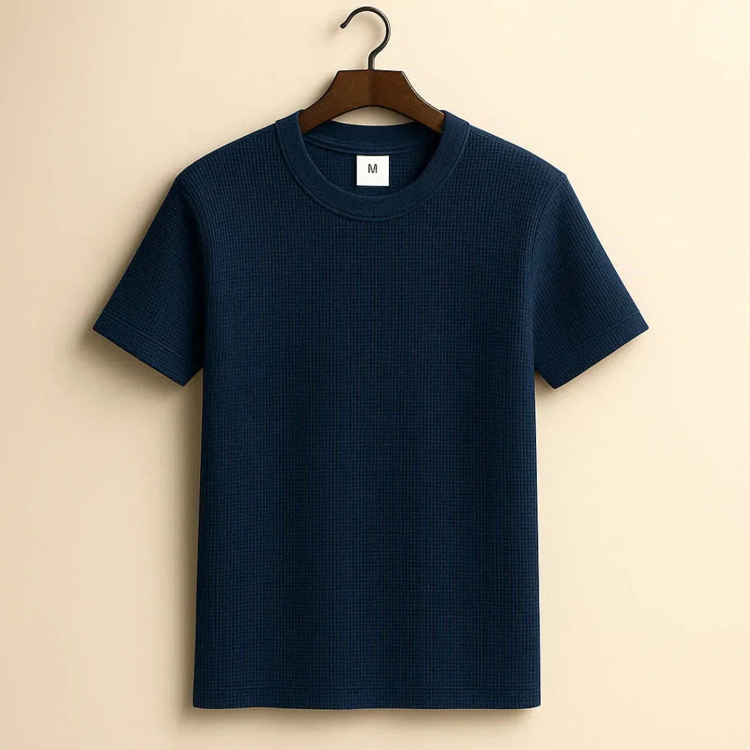 White waffle-knit cotton tee with crew neckline and ribbed collar, minimalist casual fit