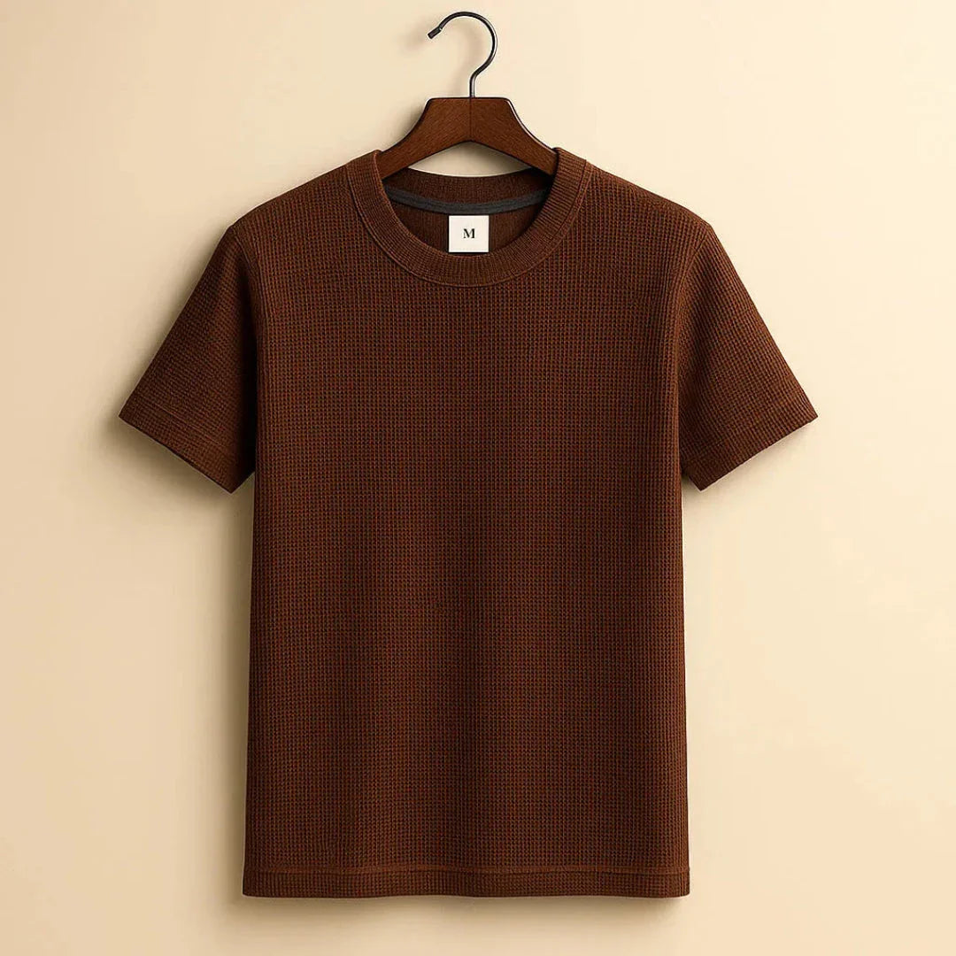 White waffle-knit cotton tee with crew neckline, minimalist silhouette and ribbed collar