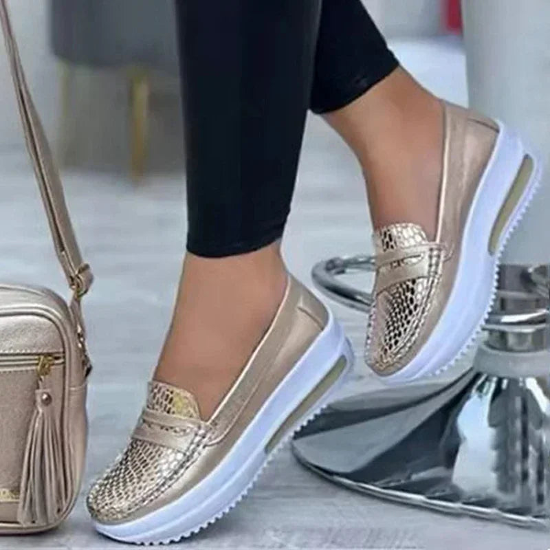 Women's breathable slip-on casual shoes in neutral tones with cushioned sole and ventilated upper