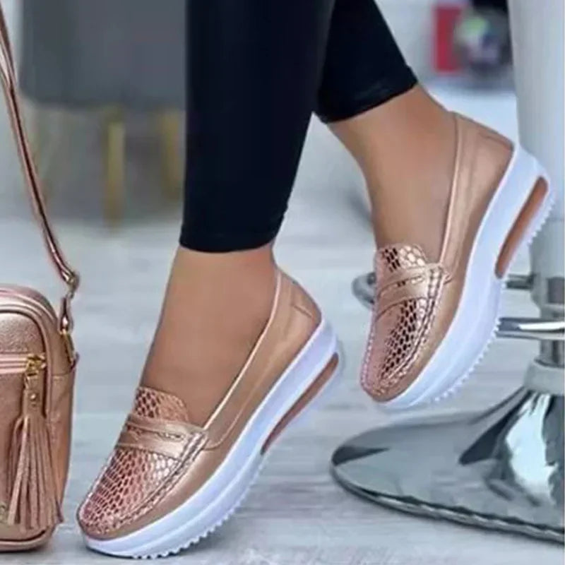 Women's breathable slip-on casual shoes in neutral tones with cushioned sole and ventilated upper