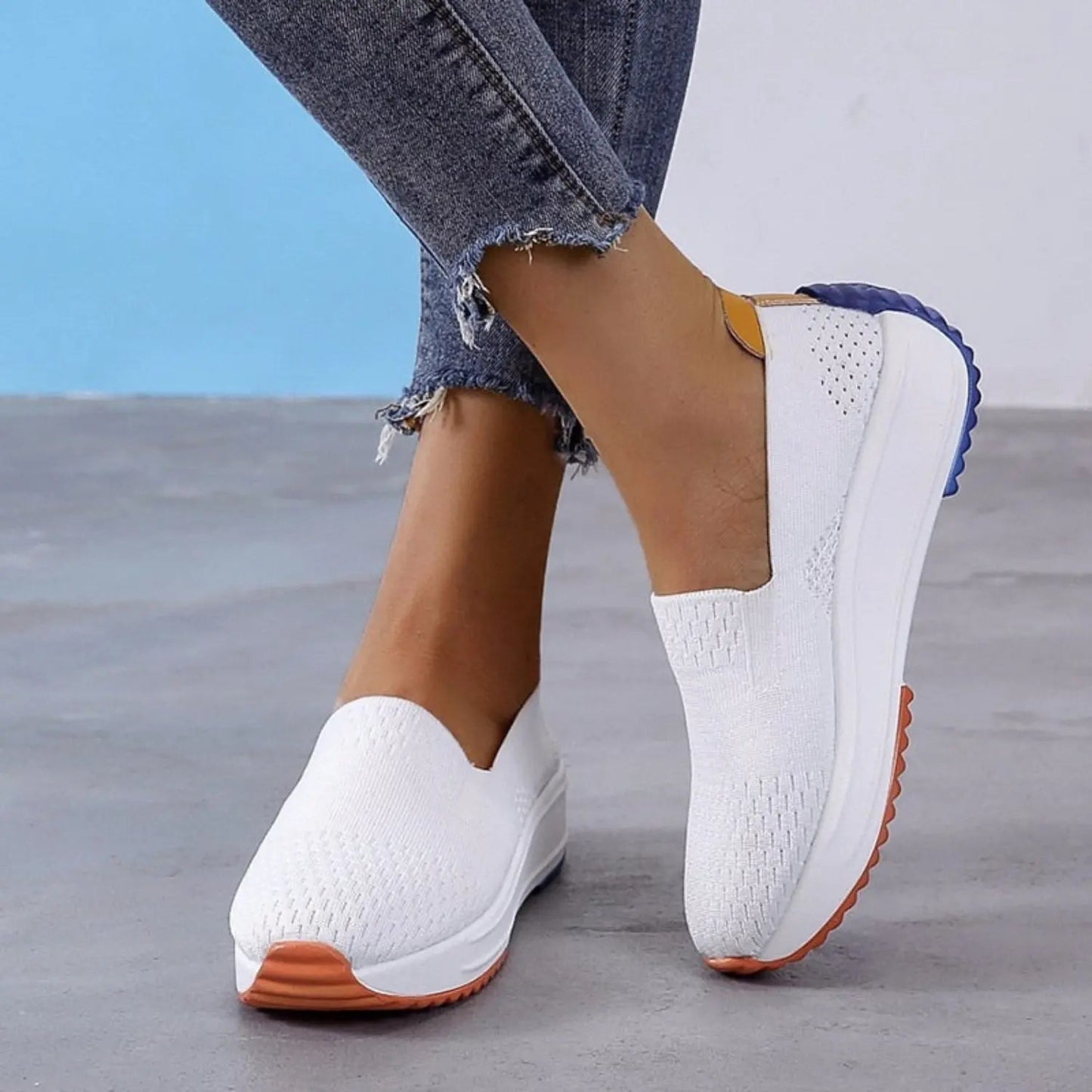 Women's lightweight slip-on sneakers in neutral tones with breathable knit upper for all-day comfort