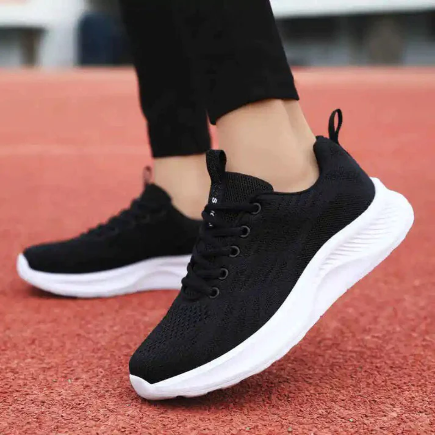 Women's white lightweight breathable knit mesh athletic sneakers with cushioned sole for running