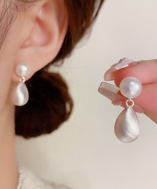 Boucles d'oreilles pendantes en or 14 carats avec perles et cuivre blanc Ovegild - Wavlynn