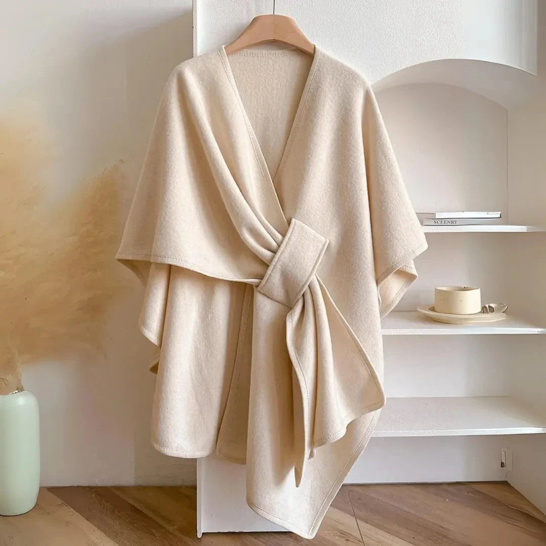 Beige loose knitted fleece cape shawl with waist-cinching hook for feminine silhouette