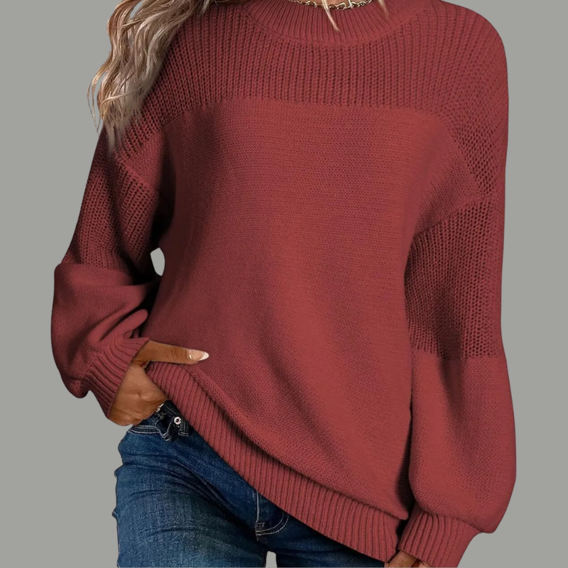 Cream loose-fitting knit sweater with relaxed drape, soft texture, and effortless casual elegance