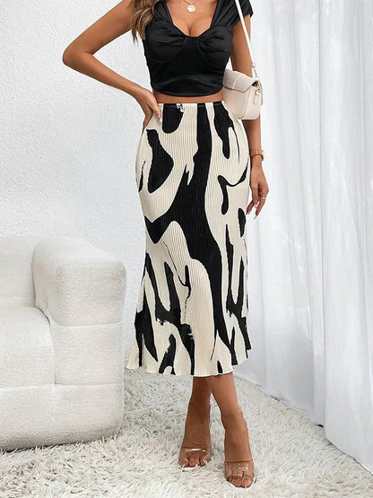 Women's black pleated A-line midi skirt with high waist, elegant modern silhouette