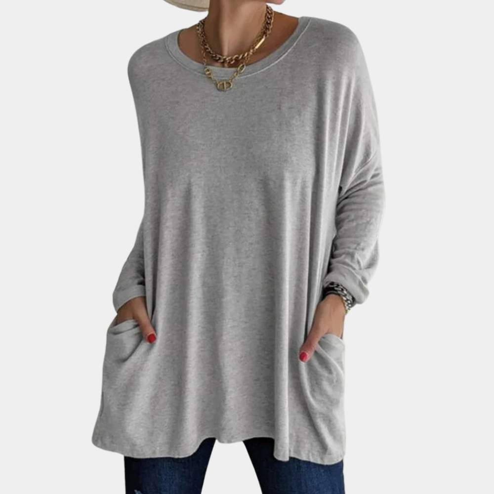 Women's oversized tunic sweater in soft knit, long sleeves, round neck with practical pockets