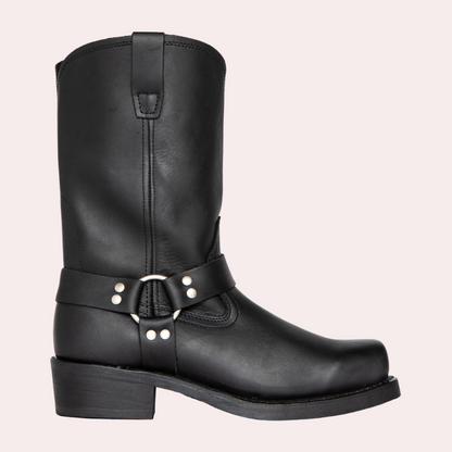 Men's brown leather harness boots with classic silhouette, sturdy heel, and iconic harness strap detail