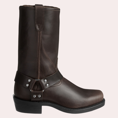 Men's brown leather harness boots with classic silhouette, sturdy heel, and iconic harness strap detail