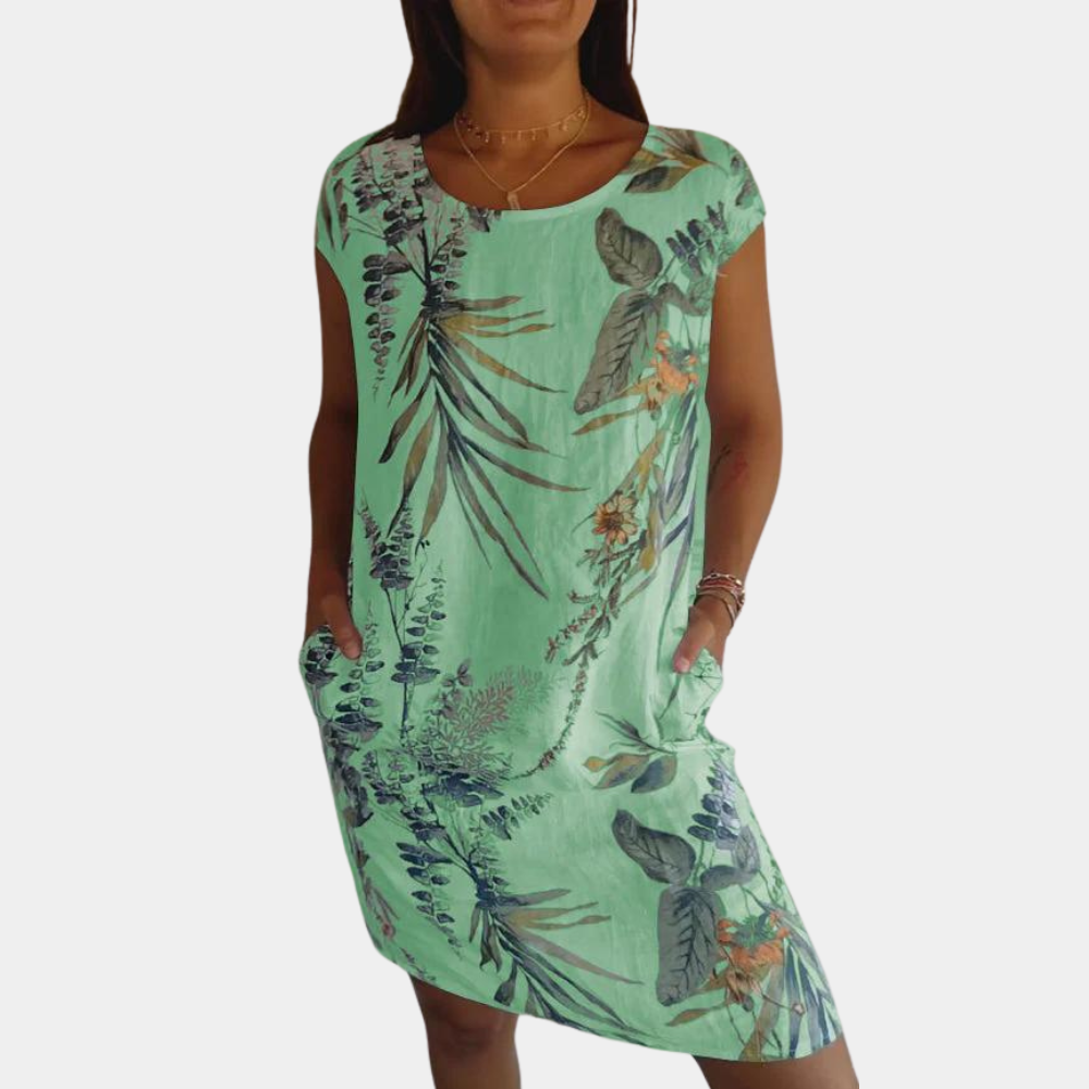 Women's relaxed fit round neck short sleeve dress with vibrant flower and leaf print pattern
