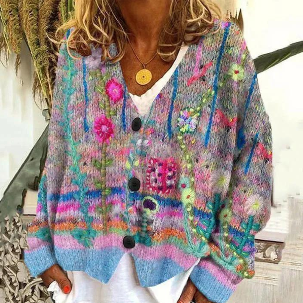 Women's oversized floral knit cardigan in boho style with V-neck button closure and relaxed silhouette