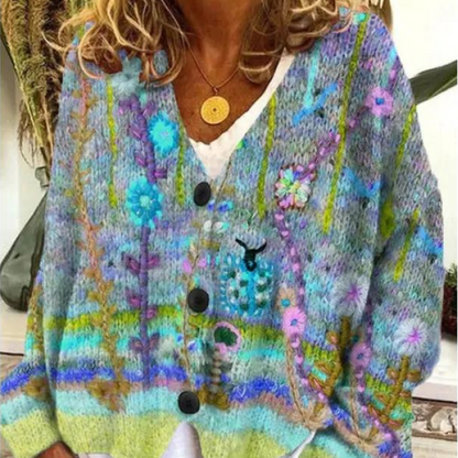 Women's oversized floral knit cardigan with V-neck button closure in bohemian multicolor pattern
