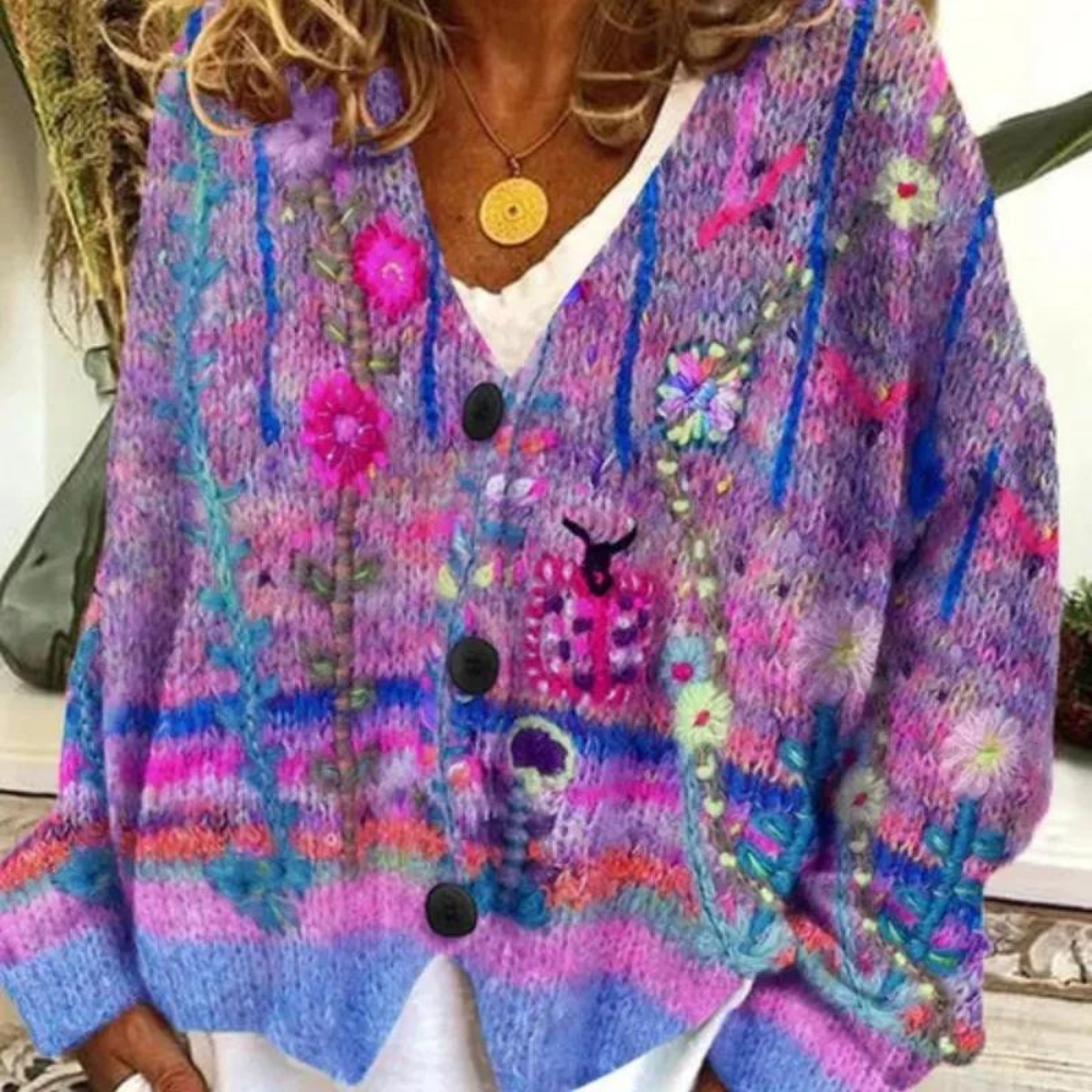 Women's oversized floral knit cardigan with V-neck button closure, bohemian cozy layering style