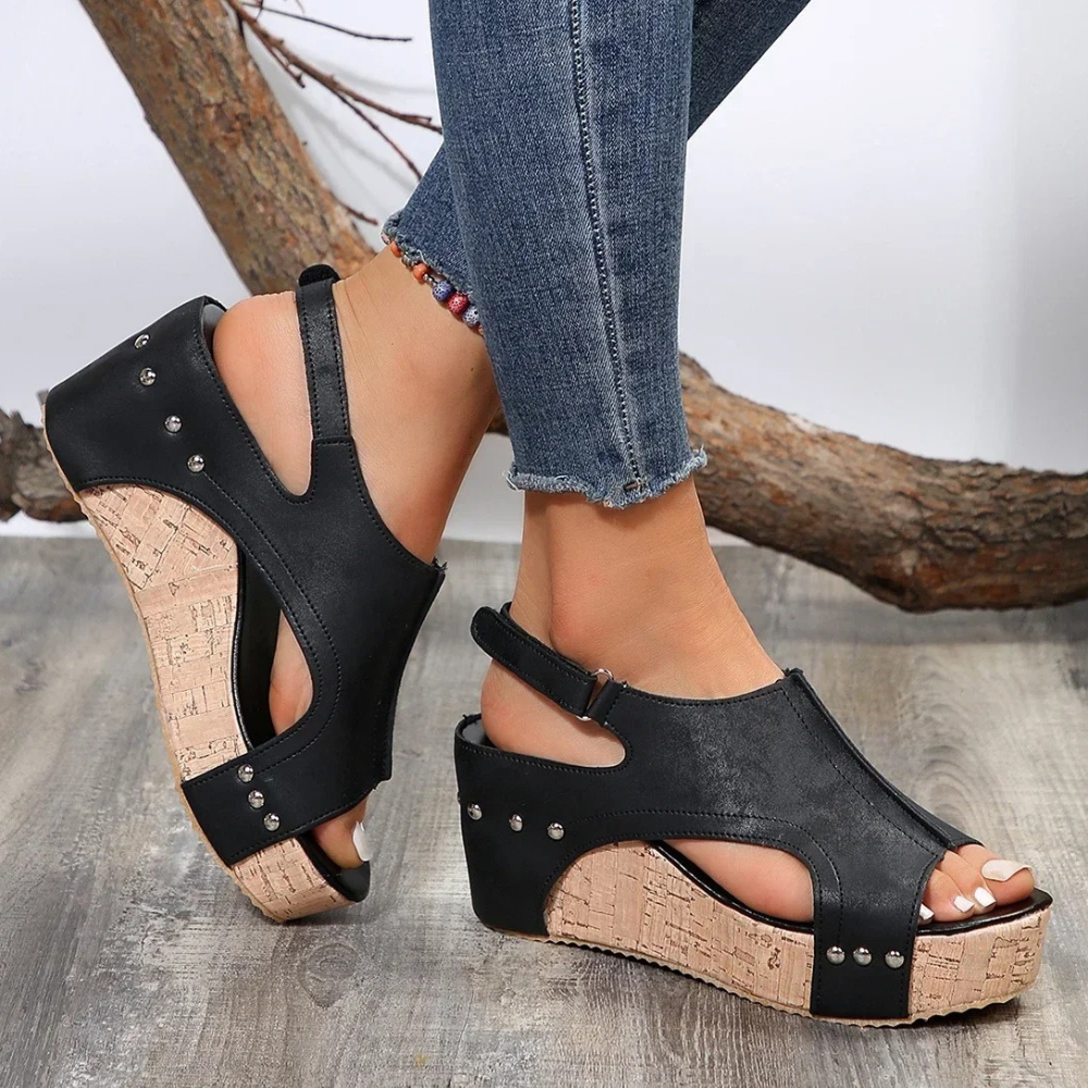 Women's open-toe wedge sandals with adjustable strap and breathable cutout platform design