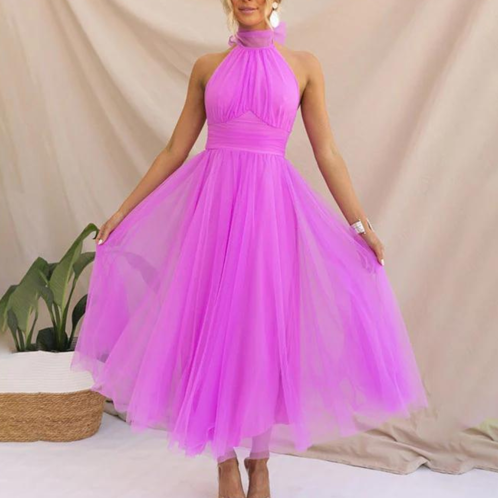 Women's chiffon halterneck midi dress, light flowy silhouette in elegant party style for warm weather
