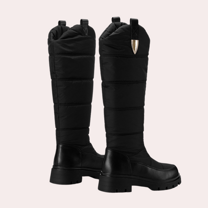 Women's black knee-high boots sleek fit polished PU leather quilted shaft rugged sole
