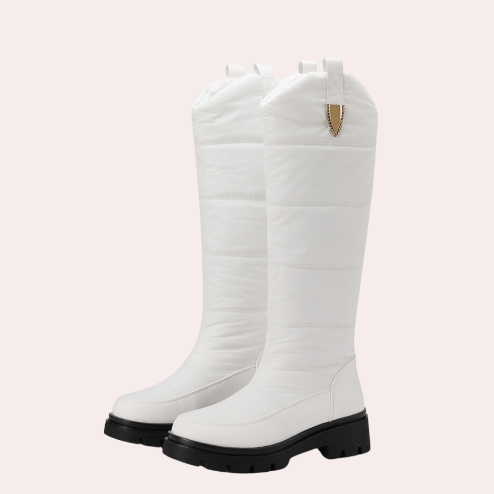 Women's black knee-high boots sleek fit polished PU leather quilted shaft rugged sole