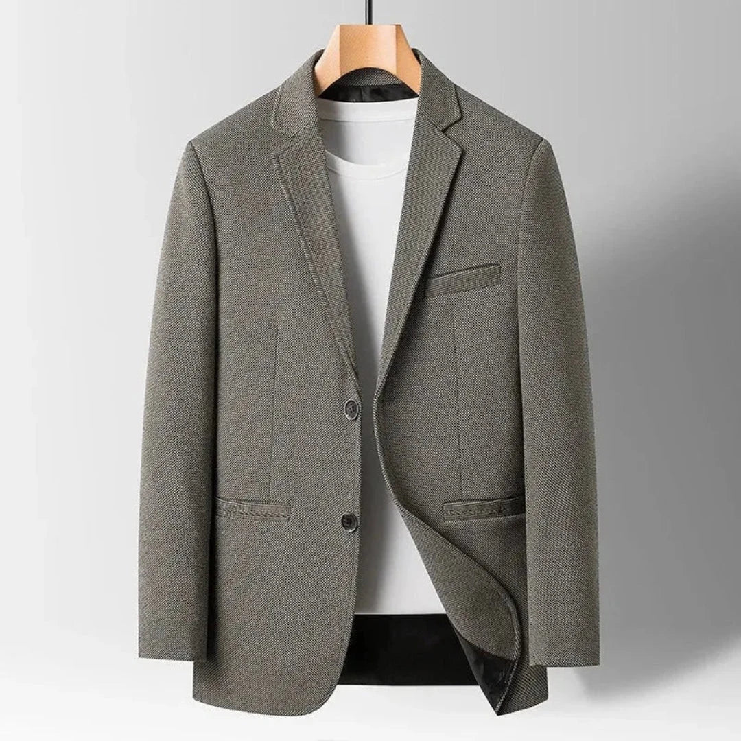 Cade charcoal wool tailored slim-fit blazer with structured shoulders and two-button closure