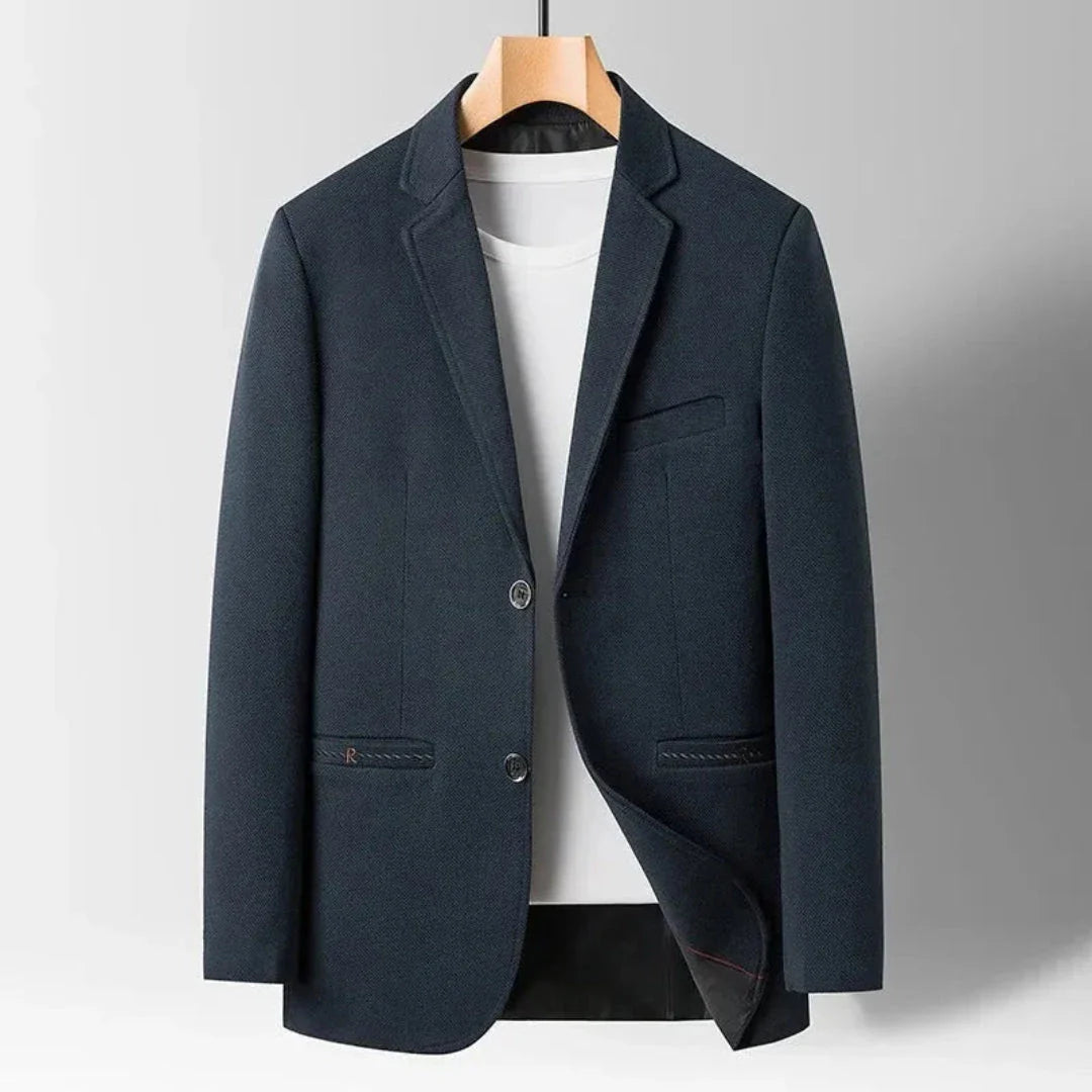 Cade charcoal wool tailored slim-fit blazer with structured shoulders and two-button closure