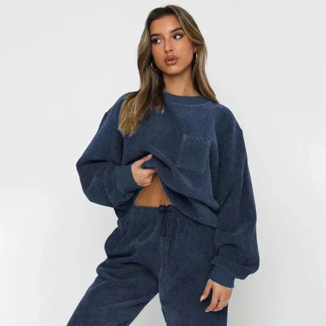 Beige corduroy oversized loungewear set with long-sleeve top, chest pocket, and matching drawstring joggers