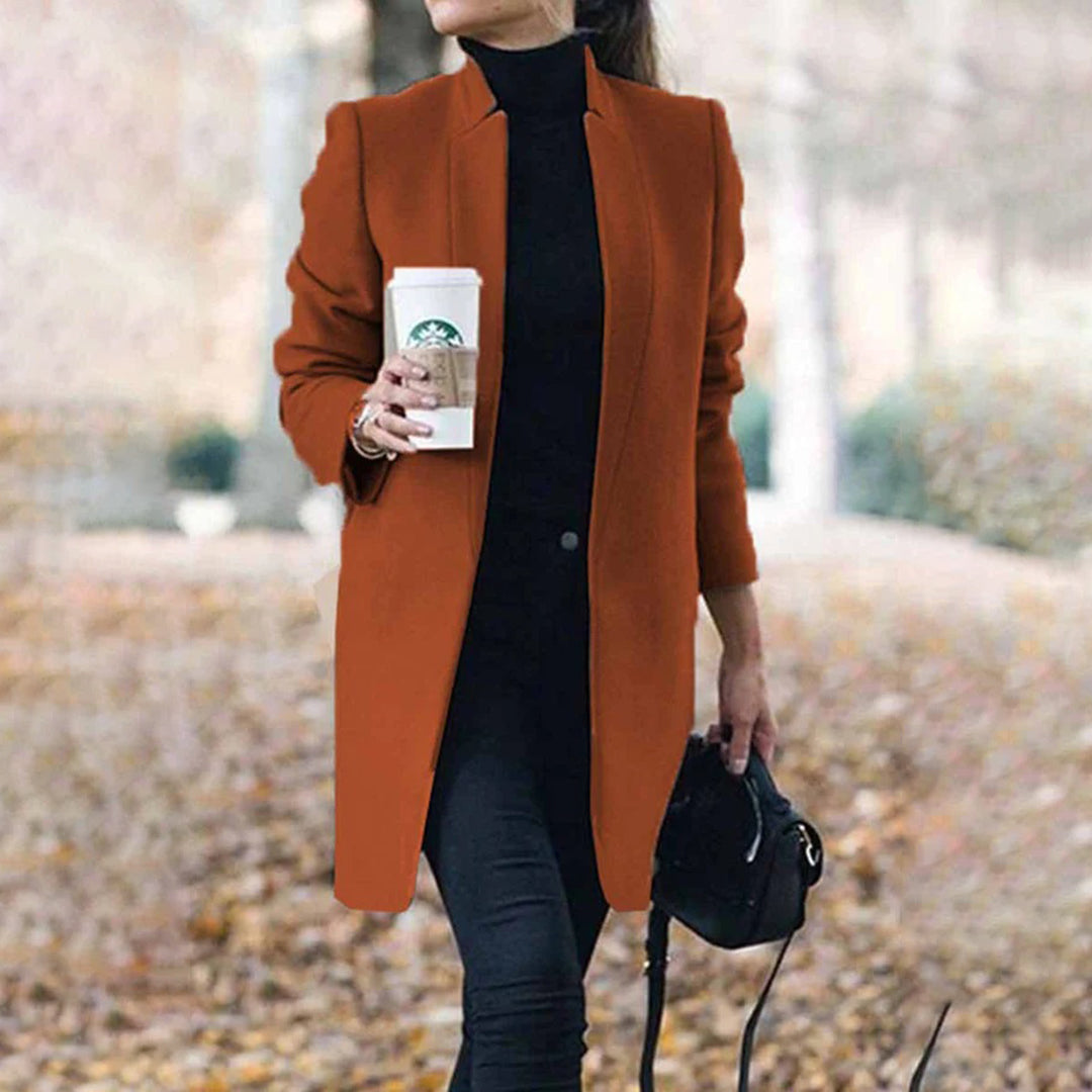 Women's tailored lapel winter coat classic structured silhouette professional cold-weather elegance