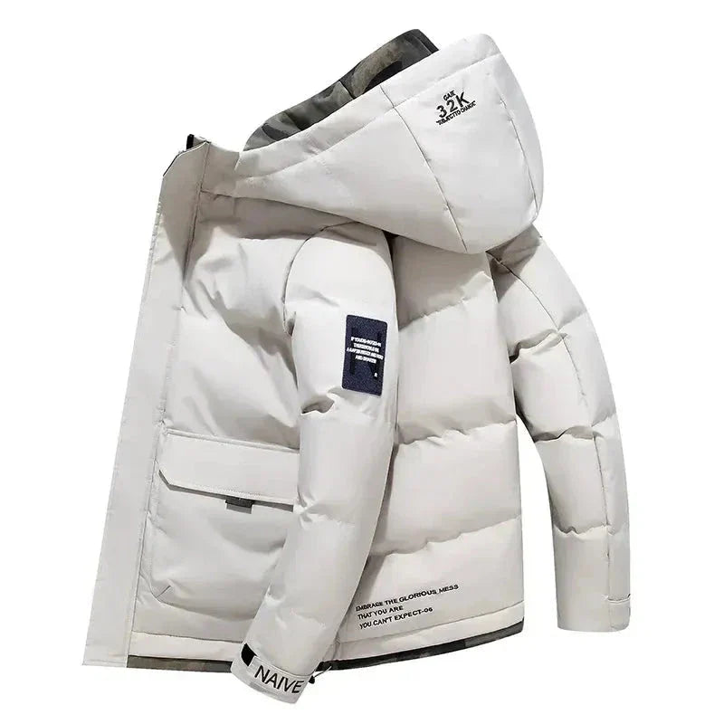 Women's black insulated puffer hooded jacket with waterproof exterior and velcro closure