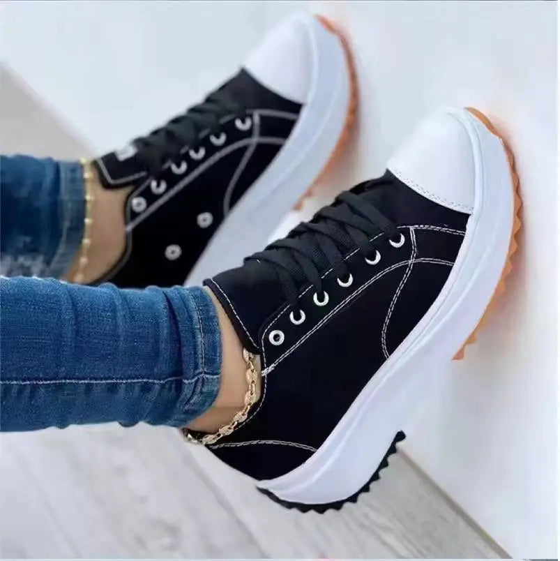 Women's white canvas platform sneakers with thick cushioned sole, casual chic everyday style