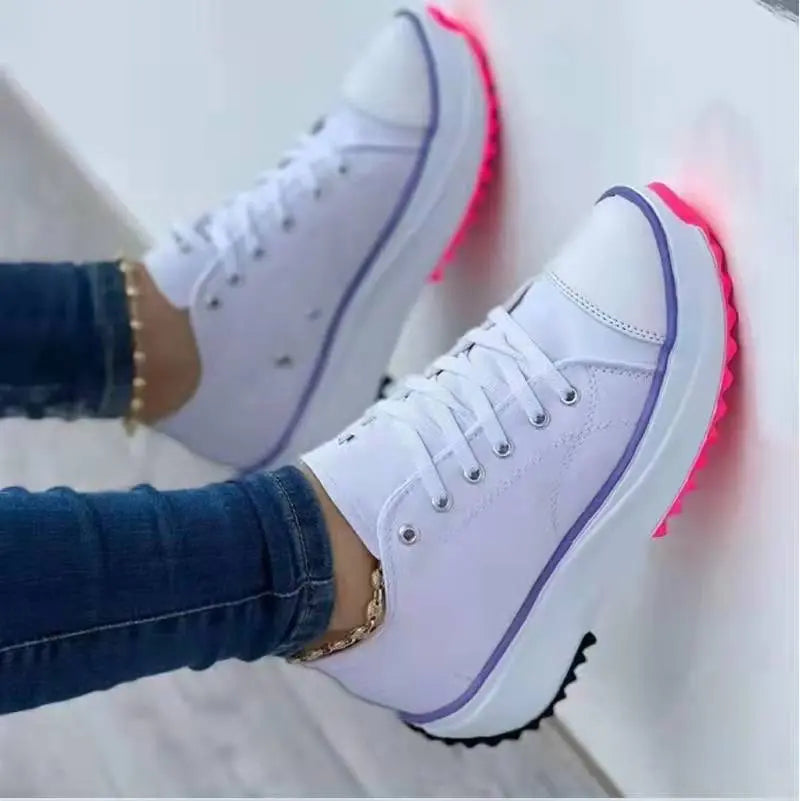 Women's white canvas platform sneakers with thick cushioned sole, casual chic everyday style