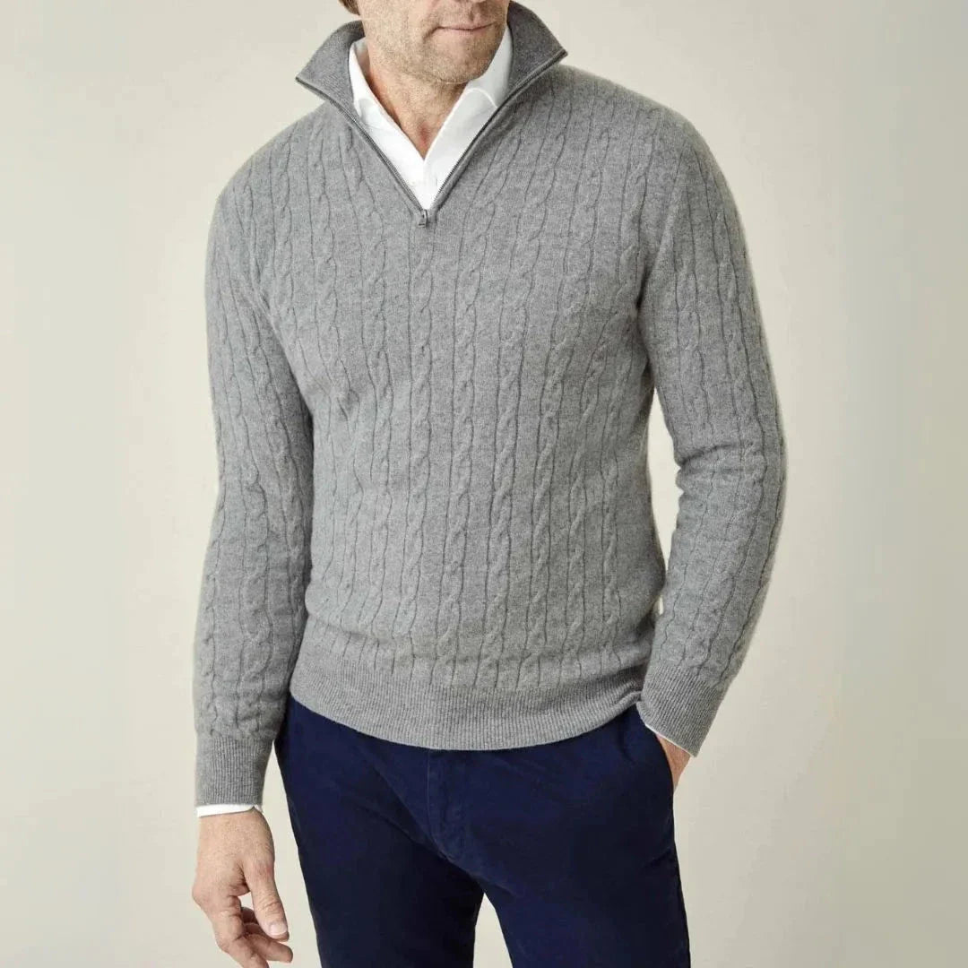 Cream cable knit quarter zip sweater with classic textured cables on body and sleeves