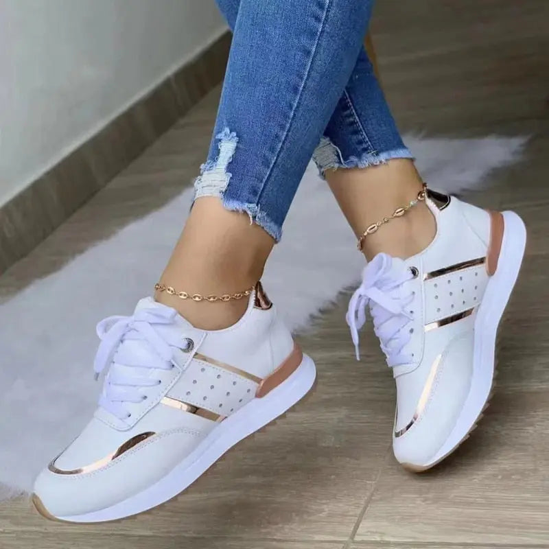Women's casual white sneakers with sleek low-top silhouette and cushioned insole for all-day comfort