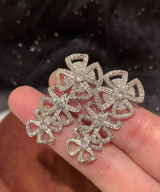 Boucles d'oreilles à tige décontractées en acier inoxydable blanc avec zircon et nœud creux - Wavlynn