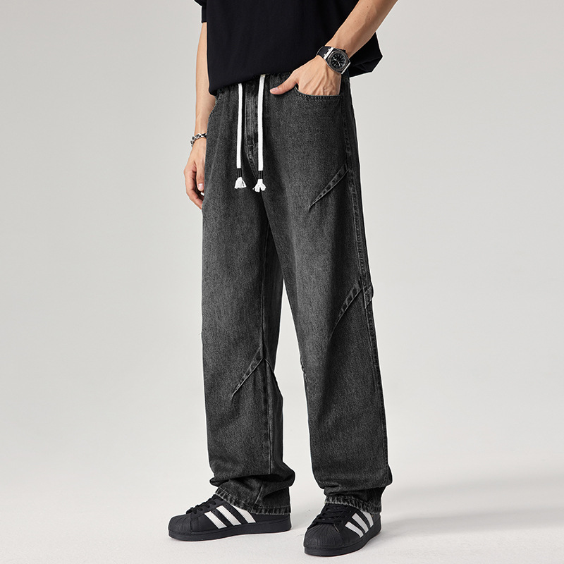Caulfield blue denim joggers relaxed fit with distressed wash and angular seam detailing