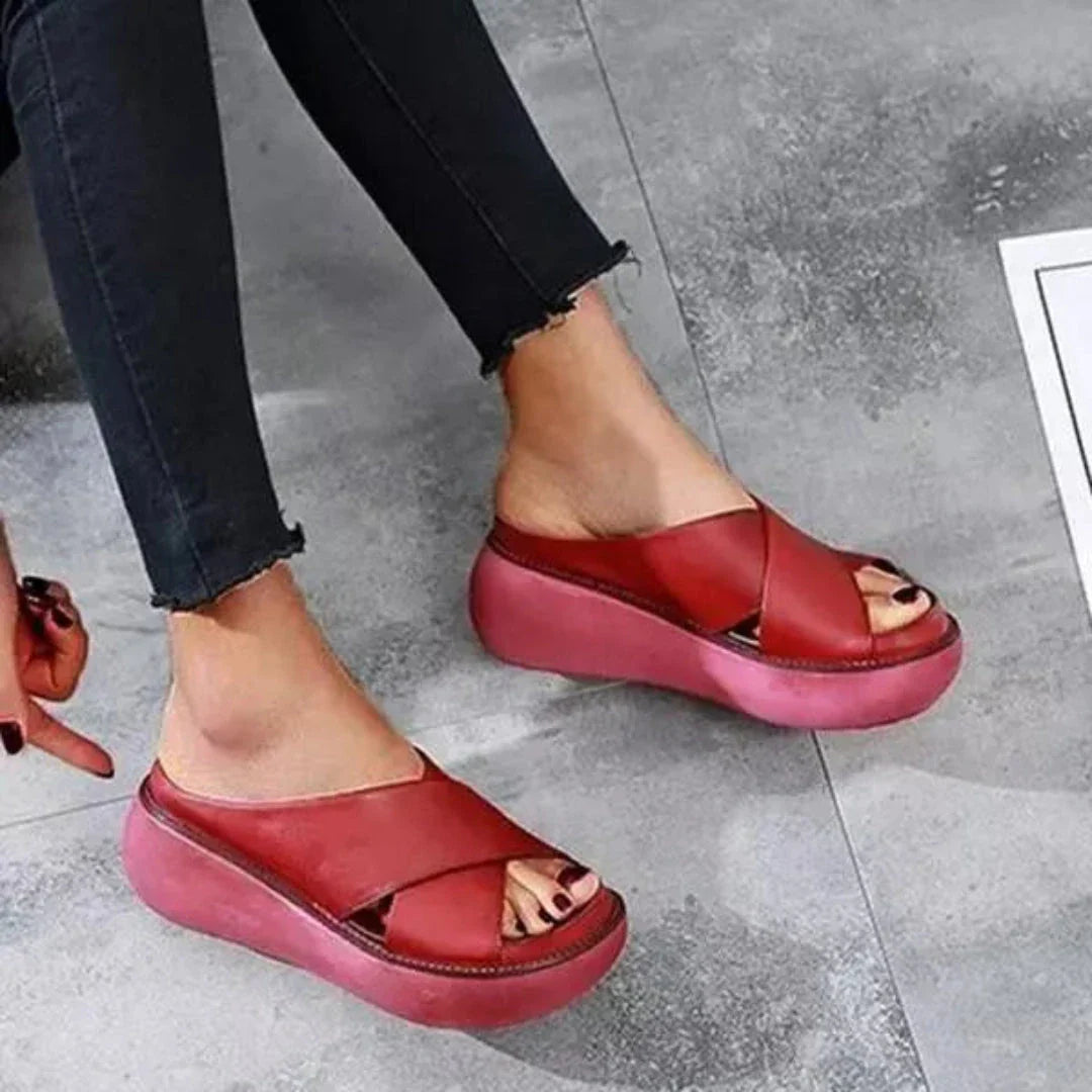 Women's beige cross-strap platform sandals with open-toe silhouette and lightweight chunky sole