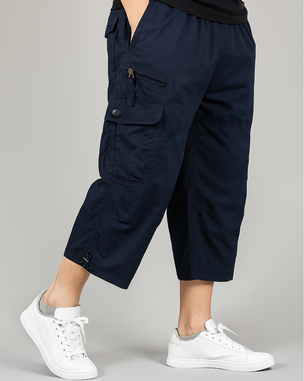 Terrain cargo shorts in washed cotton with relaxed fit, dual flap pockets, knee-length hem