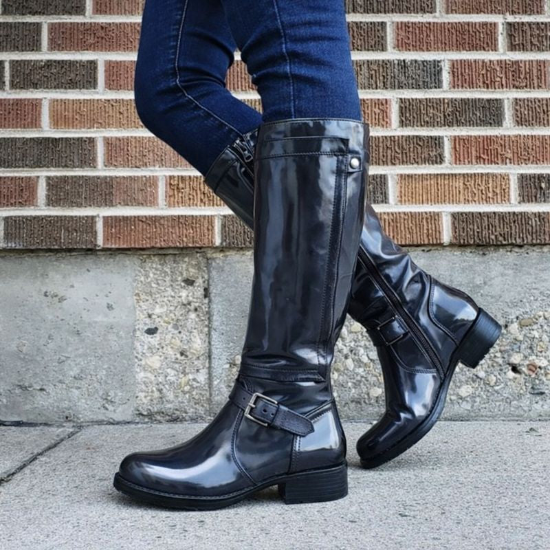Black round toe knee-high boots with sleek leg-lengthening silhouette for effortless classic style