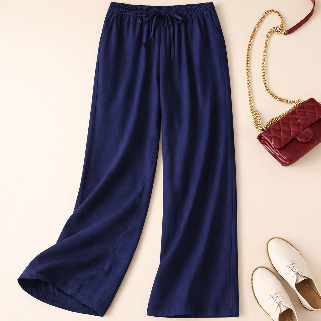 Beige relaxed drawstring pants with soft drape, breathable fabric, and easy casual-to-office versatile fit