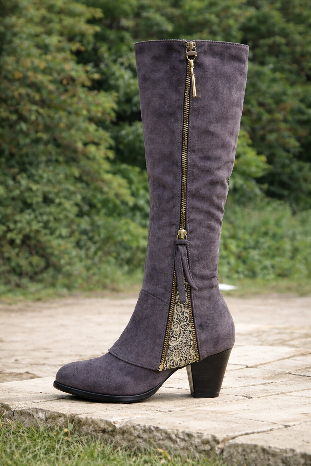 Black knee-high boots sleek elongated silhouette leg-lengthening design for all-day comfort