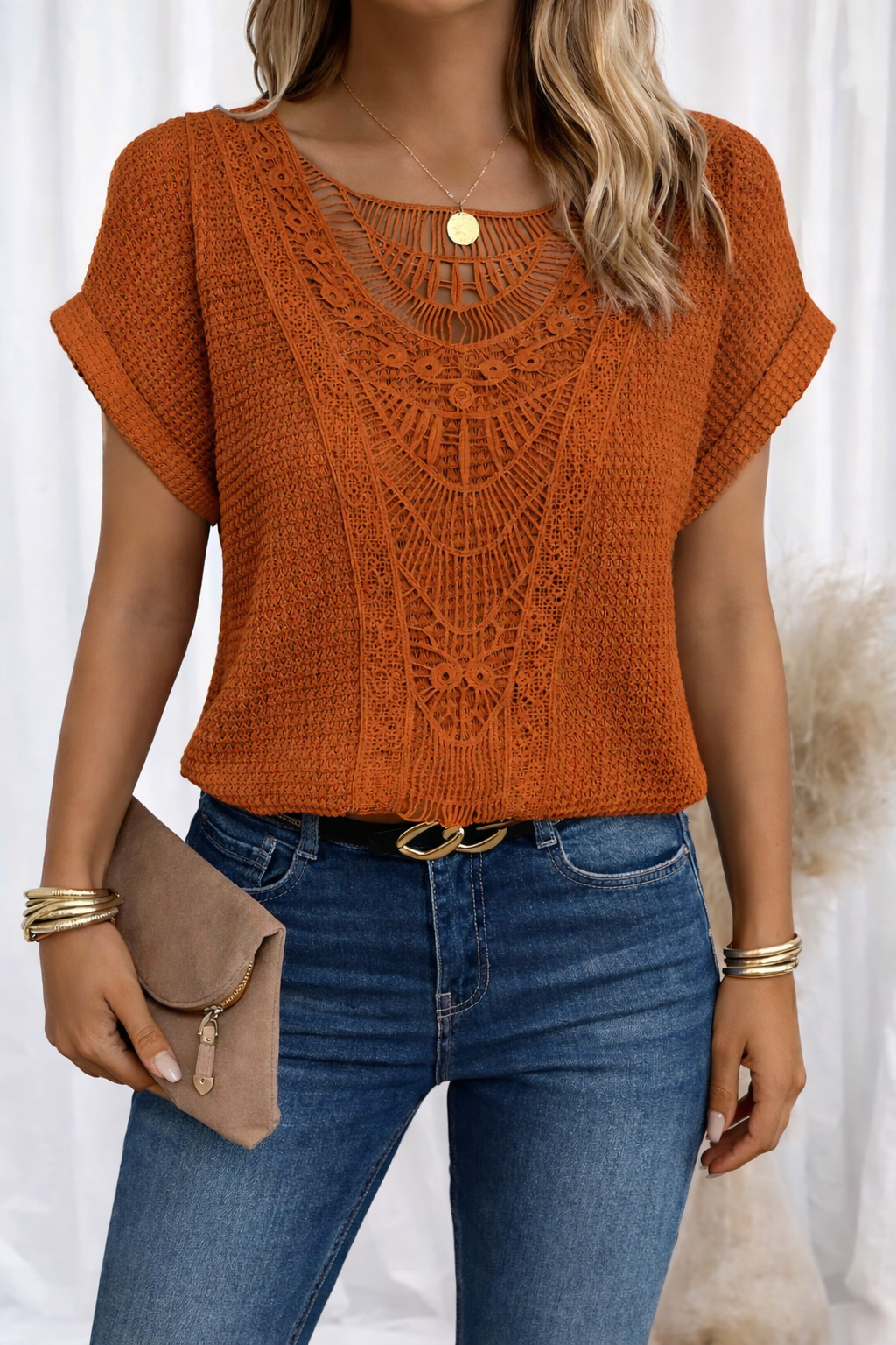 Soft feminine top with round neck, delicate lace trim, relaxed silhouette in elegant everyday style