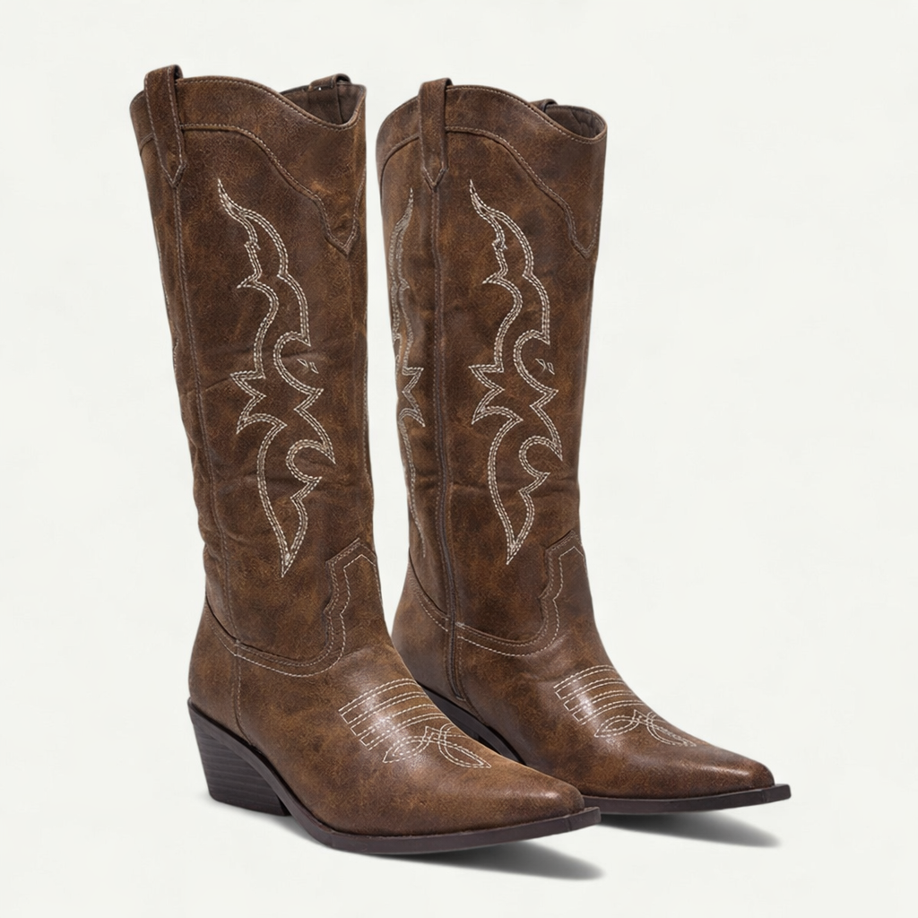 Women's western calf-high pointed toe boots in classic silhouette with leg-lengthening sculpted design
