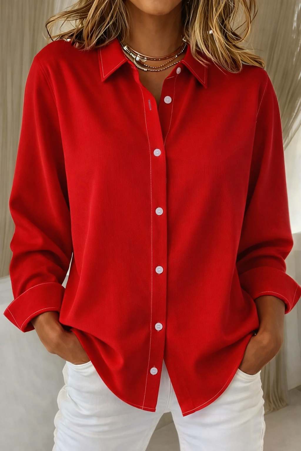 Elegant white button-down blouse with structured collar and classic front buttons, polished feminine fit