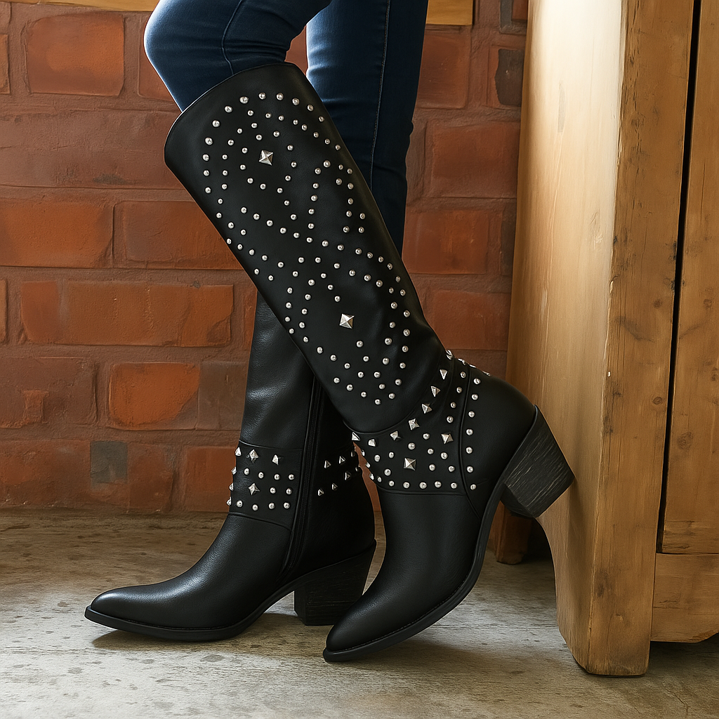 Brown leather Western knee-high boots with classic cowboy stitching and tall polished silhouette
